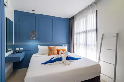 발코니가 있는 원베드룸 아파트 — Apartment at Palmyrah Surin by Lofty
